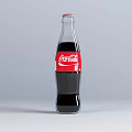 Coca Cola Glass Bottle With Red Label Containing Carbonated Dark Beverage For Daily Use