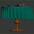 Round Table With Green Ruffled Tablecloth Orange Base And Board Game Setup