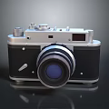 Vintage Analog Camera With Silver Black Body And Blue Lens Design