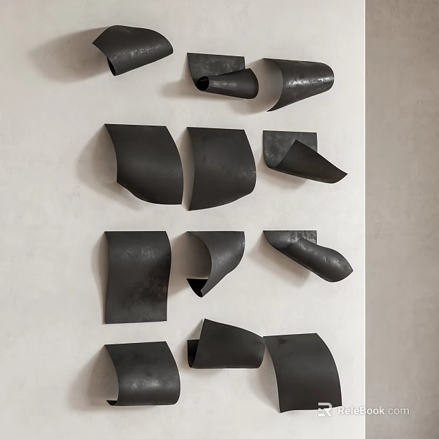 Black Irregular Shaped Wall Decor Mounted On Light Colored Wall 3d model 