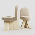 Two Modern Minimalist Dining Chairs With Beige Plush Fabric Seats And Wooden Legs