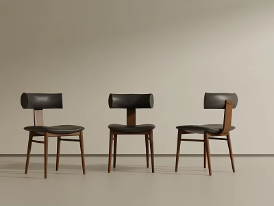 Three Modern Black Dining Chairs With Wooden Legs And Leather Seats 3d model