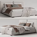 Modern Minimalist Upholstered Double Bed With Neutral Pillows And Striped Blanket Design