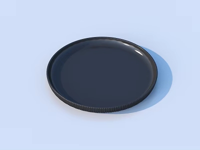 Black Round Household Item With Textured Edge And Smooth Surface 3d model