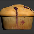 Golden Blueberry Muffin With Purple Spots And Soft Texture On Dark Surface