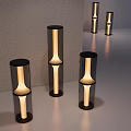 Modern Cylindrical Table Lamps With Black Base Transparent Shade And Warm Yellow Light