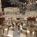 Luxurious Banquet Hall Interior With Crystal Chandeliers And Wedding Stage Decorations