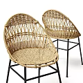 Stylish Rattan Single Chair With Woven Design And Black Metal Legs