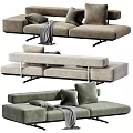 Modern Upholstered Two Seater Sofa With Green Beige Tones Plush Pillows And Soft Blanket