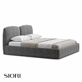 Gray Upholstered Double Bed With White Pillows And Beige White Sheets