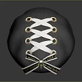 Black Stone Sculpture With White Lacing Golden Rings Crisscross Design And Text Label