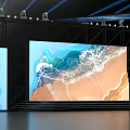 Modern Stage Design With Large Screen Showing Ocean Waves Sand Beach And Lighting Equipment