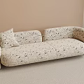 Beige Two Seater Sofa With Black Floral Pattern Curved Armrests And Backrest
