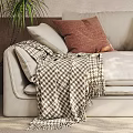 Beige Multi Seater Sofa With Brown Cushions Plaid Blanket Wall Art And Floor Lamp