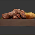 Roasted Pork Ribs and Golden Potato with Fresh Green Garnish on Wooden Board