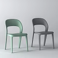Two Light Green And Gray Modern Sleek Dining Chairs With Simple Design