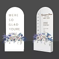 Floral Display with White Archway Welcome Text and Blue White Flowers for Hotel Event