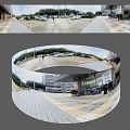 Scenic Outdoor View With Parking Lot Buildings Trees And Tiled Square Entrance