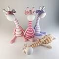 Colorful Striped Giraffe Plush Toys in Pink Purple and Beige Sitting Lying