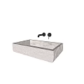 Natural Stone Textured Washbasin With Black Faucets And Above Counter Design