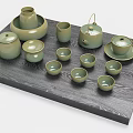 Minimalist Light Green Ceramic Tea Set with Teapot Teacups and Caddy on Dark Wood Tray