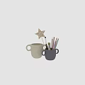 Elephant Shaped Beige And Gray Mugs With Brush Colored Pencils And Star Decoration