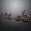 Hand Carved Sculptures With Intricate Curved Designs And Detailed Patterns