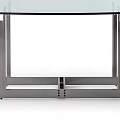 Modern Glass Top Table With Sleek Metal Frame And Contemporary Design