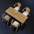 Wooden Dining Table Set with Four Chairs Light Colored Cushions and Vase with Flowers