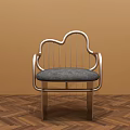 Cloud Shaped Metal Leisure Chair With Gray Padded Seat And Armrests On Wooden Herringbone Floor