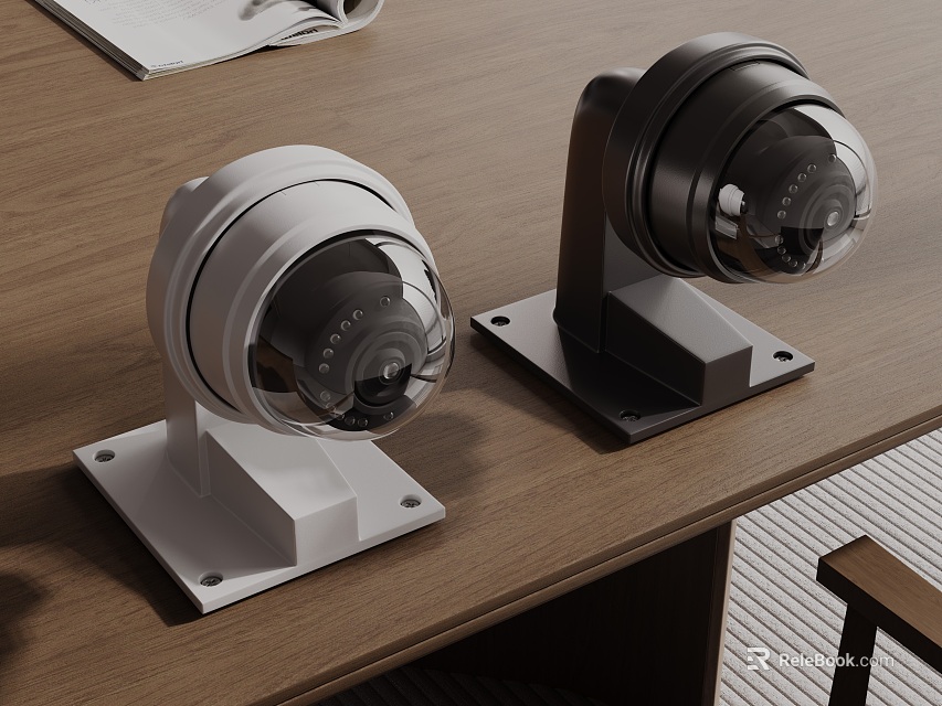 White And Black Dome Security Cameras Placed On Wooden Desk 3d model 