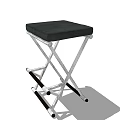 Black Padded Seat Stool With Silver Metal Crossed Legs And Folding Design