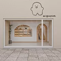 Cozy Dessert Shop Interior Featuring Wooden Counter Display Shelves Arched Doorway And Wall Signage