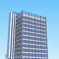 Modern High Rise Office Building Featuring Glass Facade And Architectural Design