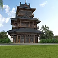 Traditional Chinese Wooden Tower With Multi Tiered Black Tiled Roof Overhanging Eaves And Green Lawn