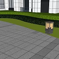 Outdoor Lights Illuminating Modern Building Exterior With Lawn And Stone Path