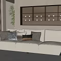 Modern Cream Three Seater Sofa With Decorative Pillows In Living Room