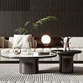 Modern Round Coffee Tables With Marble Tops Black Bases White Sofa Green Plant And Lamp