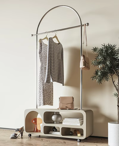 Clothing Rack Featuring Hanging Striped Patterned Dresses Handbag Nearby Plant on Cabinet 3d model