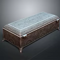 Ornate Metal Clothing Storage Box With Intricate Carvings And Decorative Feet
