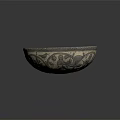 Elegant Vintage Metal Bowl With Intricate Carved Patterns And Blueish Interior Design