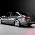 Silver Sedan Car With Sleek Four Door Design Alloy Wheels And Shiny Exterior