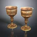 Sculpture Carving on Golden Goblets Featuring Intricate Patterns Red Gemstone Inlays and Ornate Stems