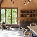 Hotel Guest Room Featuring Wooden Walls Large Windows Forest View Stove And Dining Area