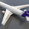 FedEx Commercial Passenger Airliner With White Fuselage Purple Tail And Logo