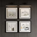 Photo Wall With Four Framed Natural Scenery Artworks On Dark Wooden Wall With Overhead Lights