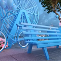 Top Outdoor Photo Check In Spot With Blue Circular Bar Decorative Tree Balloons And Desserts