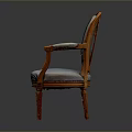Classic Armchair with Carved Wooden Frame and Soft Blue Upholstered Seat