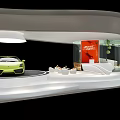 Modern Car Showroom Interior With Green Sports Car Display Platform And Lounge Area