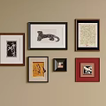 Photo Wall with Multiple Frames and Various Patterns on Beige Wall Interior